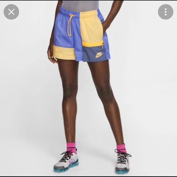 Nike Pants - Nike Icon Clash High-Waisted Shorts in Blue